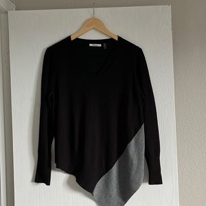 Asymmetrical light sweater